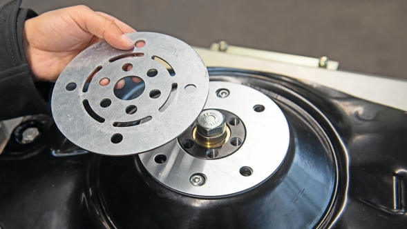 Overload disc Close-up of a hand holding the overload disc.