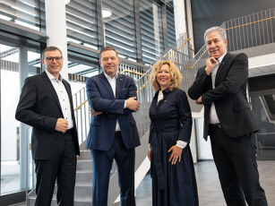 Walter Wagner, Christoph Gröblinghoff, Ingrid Bußjäger-Martin & Ekkehart Gläser stand next to each other in a stairwell