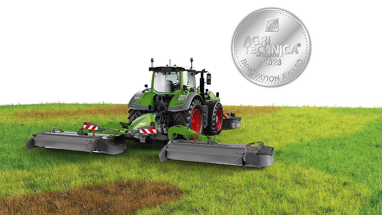 Fendt tractor in a meadow with the Fendt Slicer mower combination, winner of the AGRITECHNICA Innovation Award silver medal