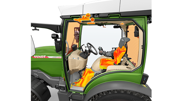 Vue intérieure d'une cabine Fendt e100 V Vario dans laquelle divers éléments chauffants sont visibles
