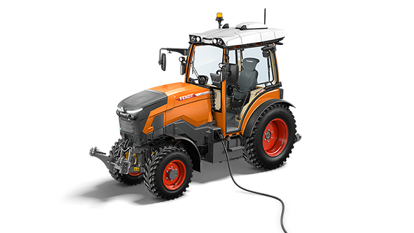 Image libre de droits d'un Fendt e100V Vario avec la peinture orange typique de l'utilisation communale.