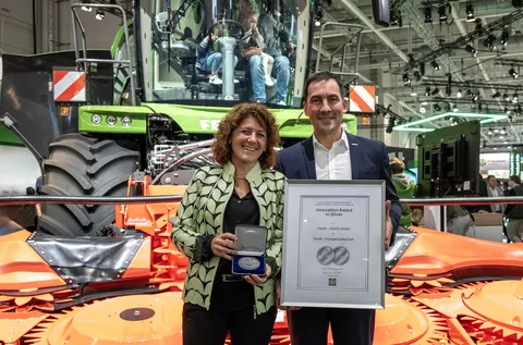 Katalin Csehi & Dr. Josef Mayer in front of the Fendt Katana