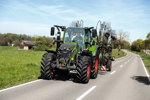 Fendt 620 Vario with Fendt tedder in combination on the road