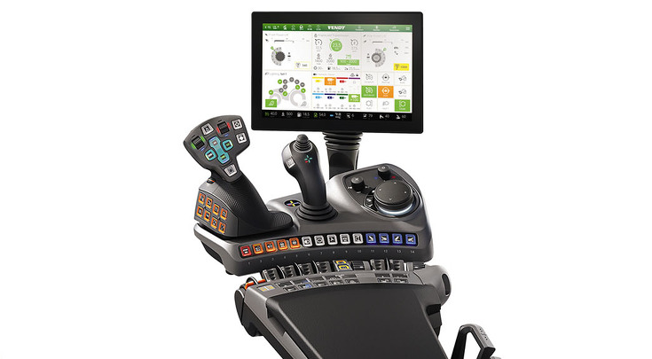 Driver workplace, armrest with multi-function joystick and screen.