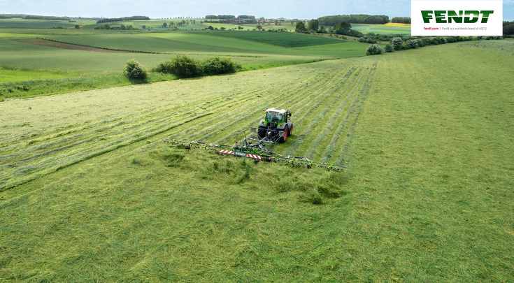 The Fendt Twister turning grass in grassland.