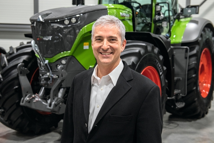 Eric Hansotia (President, Chairman and CEO AGCO Corporation) in front of a green Fendt tractor Eric Hansotia (President, Chairman and CEO AGCO Corporation) in front of a green Fendt tractor