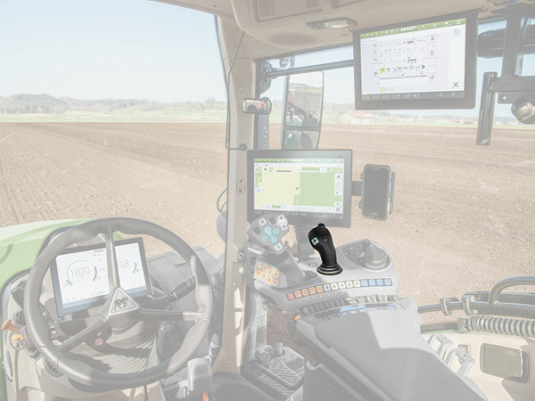 Crossgate lever / 3L-joystick Close-up of the Fendt 700 Vario Gen6 cab in which the crossgate lever is highlighted in colour.