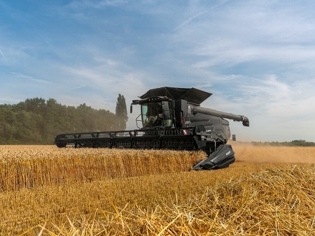 The black Fendt IDEAL combine harvester at work