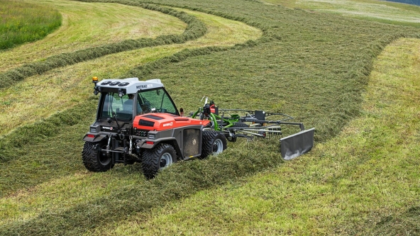 Fendt Former Alpine Fendt Former Alpine swathing in a meadow, swath tracks can be seen in the background.