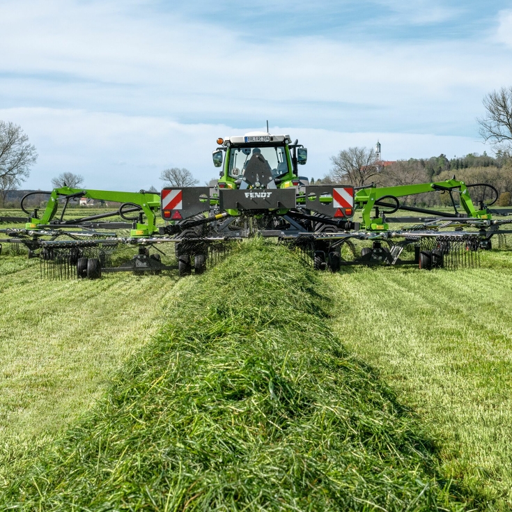 A Fendt tractor with a Fendt Former while raking