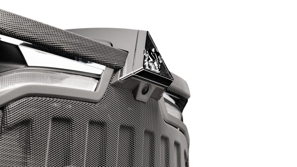 Detailed view of the bonnet of the Fendt 600 Vario against a black background