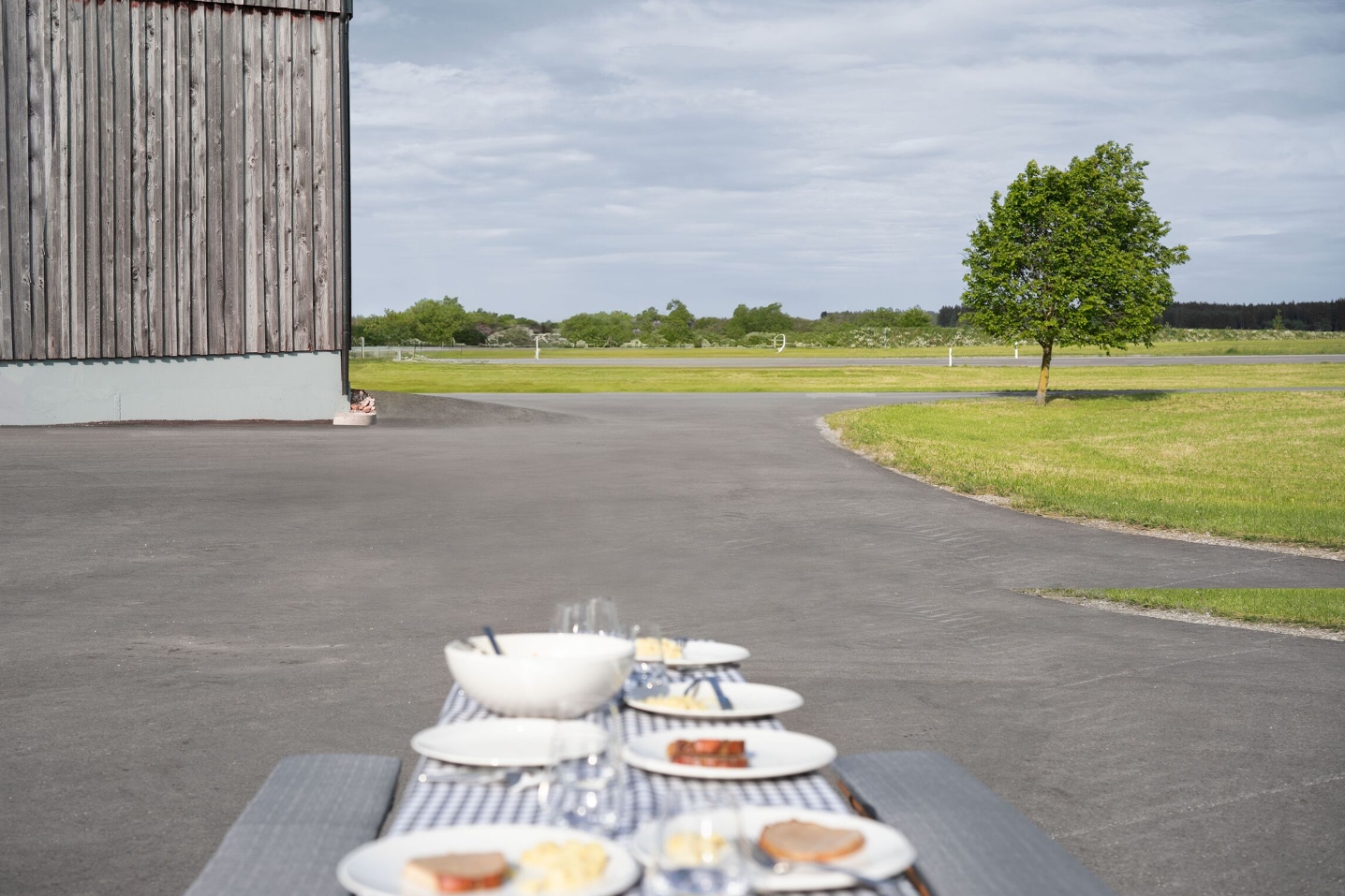 Mood picture Farm entrance View of a farm entrance with table set in front of it