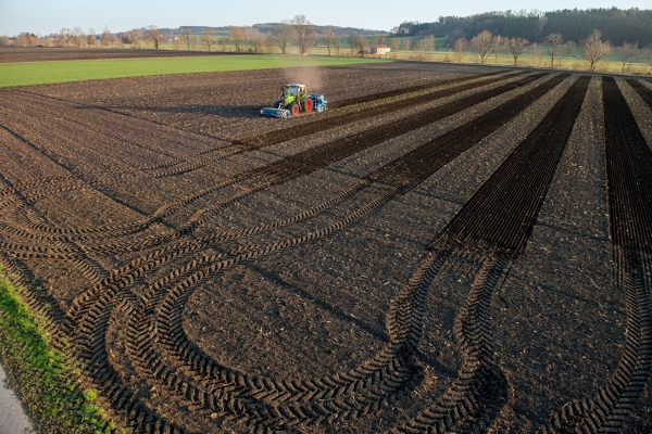View of a field with Fendt tractor using its guidance system