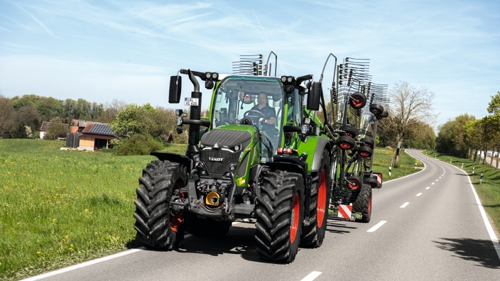 Fendt 620 Vario with Fendt tedder in combination on the road