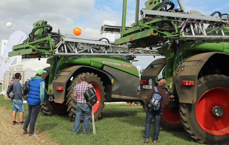 Visitors are intrigued by the sprayer technology on the Fendt stand.