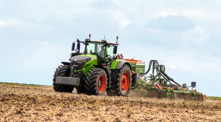 A FENDT 1000 VARIO works the field