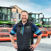 Mr Ludovic Renon stands in front of three Fendt Katana combine harvesters
