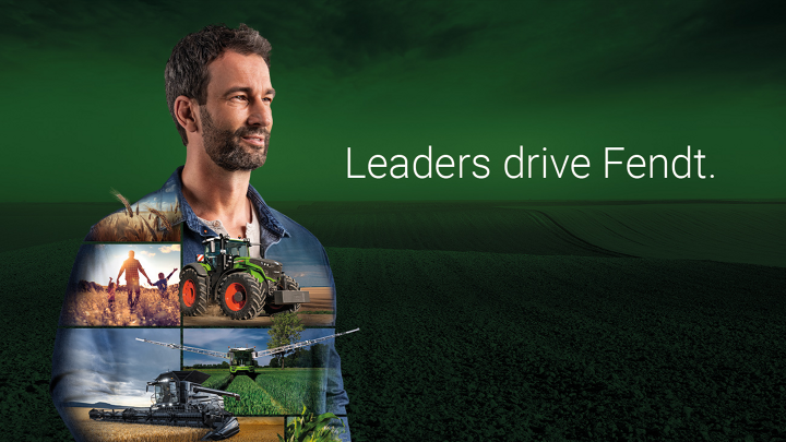 A farmer standing in front of a green background and looks motivated into the future. Fendt products are depicted on his shirt.