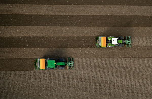Fendt 728 Vario Gen7 with seed drill in the field with a view from above