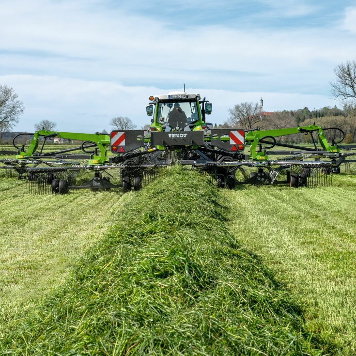 A Fendt tractor with a Fendt Former while raking