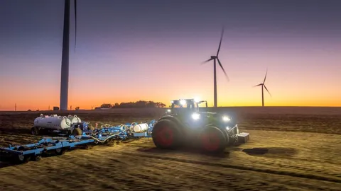 Fendt 1000 Vario in the field at sunset
