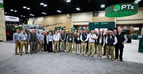 Fendt, Massey Ferguson and PTx teams together in front of PTx booth