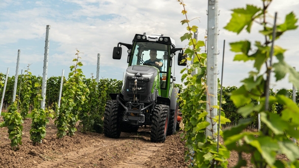 Fendt e100 V Vario Viticulture The Fendt e100 V Vario driving a seed drill in the vineyard