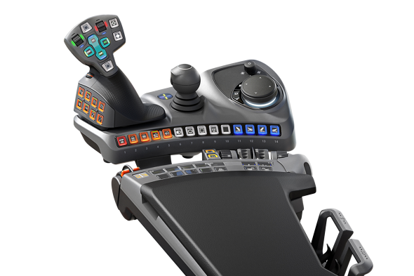 Operating armrest of a Fendt tractor with black padding, crossgate lever with colourful symbol buttons and an integrated 10-inch dashboard, taken against a white background.