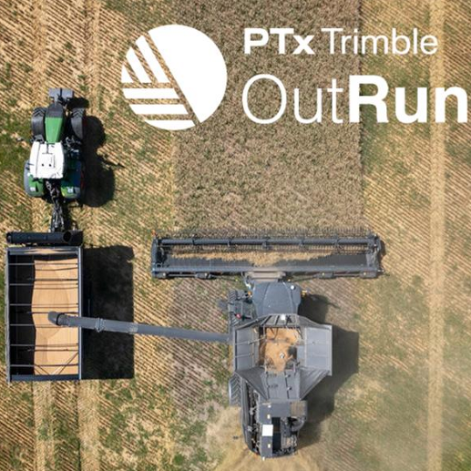 Fendt 900 Vario pulls grain cart autonomously beside a Fendt IDEAL Combine