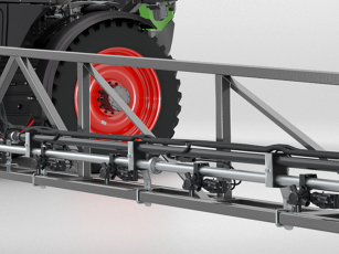Close-up of agricultural equipment with focus on the spray boom section.