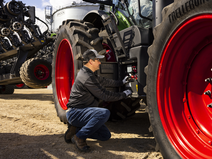 Fendt Service Tech on the Fendt tractor