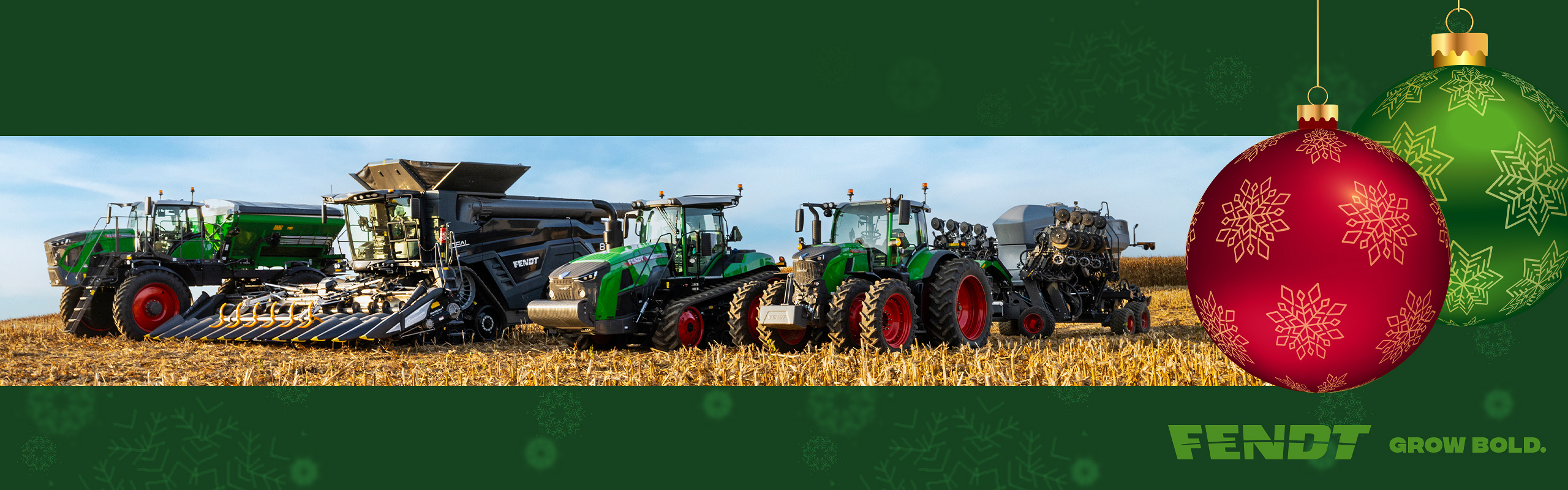 Fendt tractors with Rogator and Momentum in a field with Merry Christmas border