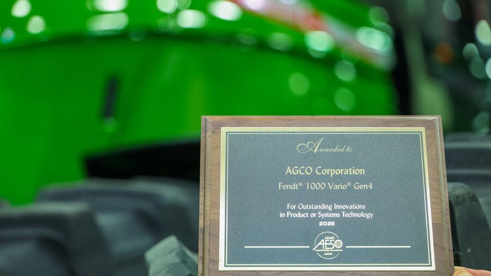 AE50 Award in front of the Fendt 100 Vario Tractor
