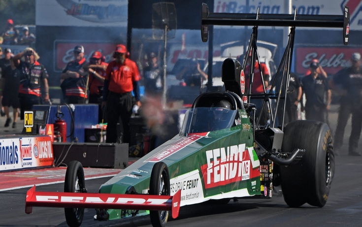 Fendt sponsored NHRA race car on the track