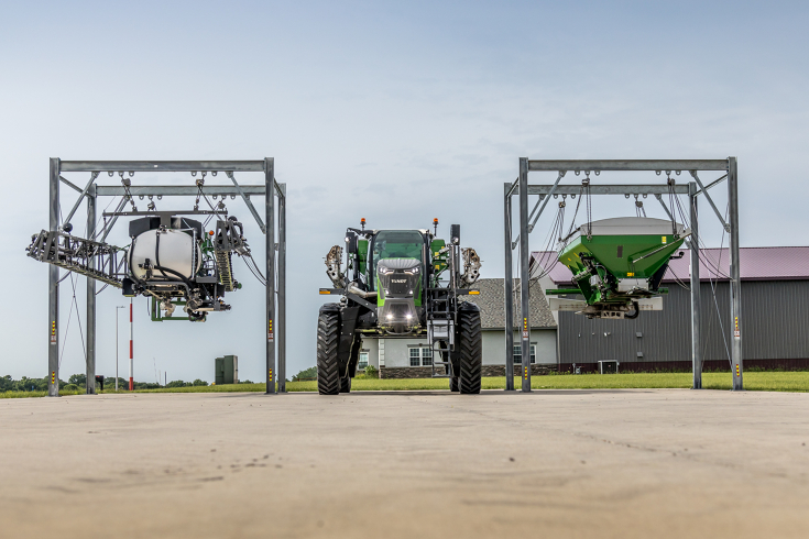 Application Lift System with the Rogator in the middle and the spinner and boom hanging on the life structure with chains