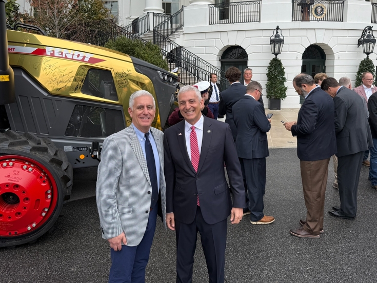 Eric Hansotia at the White House beside the Golden Fendt Tractor Eric Hansotia at the White House beside the Golden Fendt Tractor